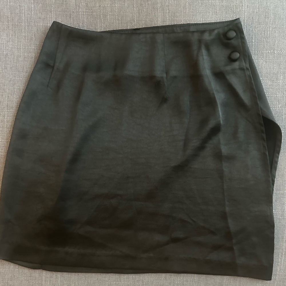 Meshki asymmetrical wrap satin mini skirt. Size small. Color black.